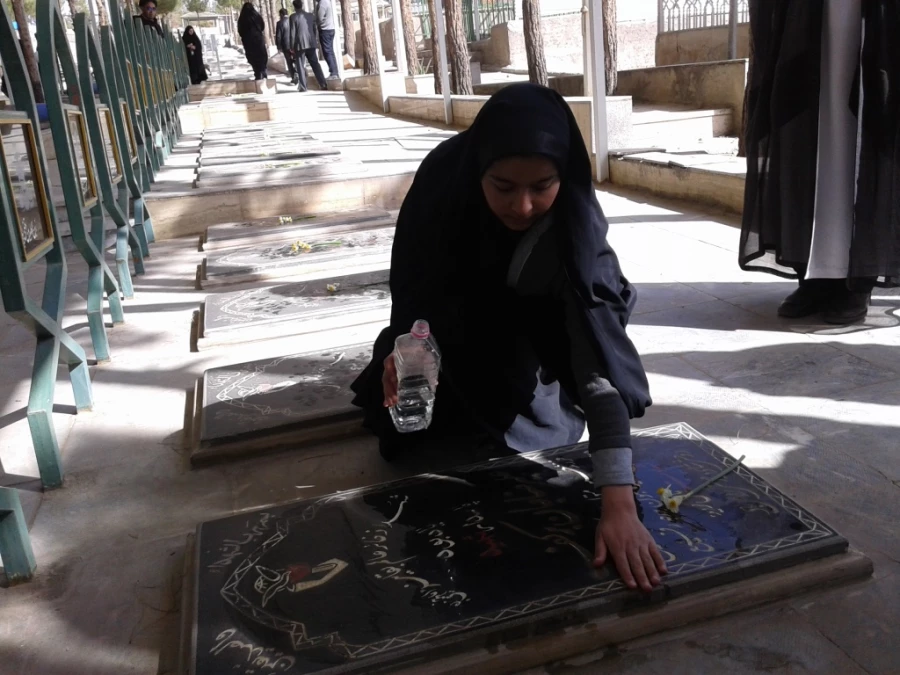 مراسم غبارروبی و عطرافشانی مزار شهدای بیرجند 16